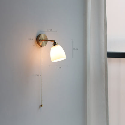 Adjustable Wall Lamp In Front Of Mirror In Bedside