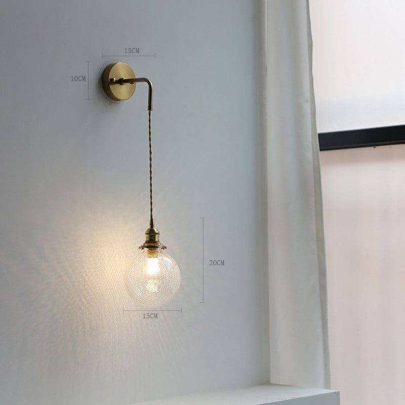 Adjustable Wall Lamp In Front Of Mirror In Bedside