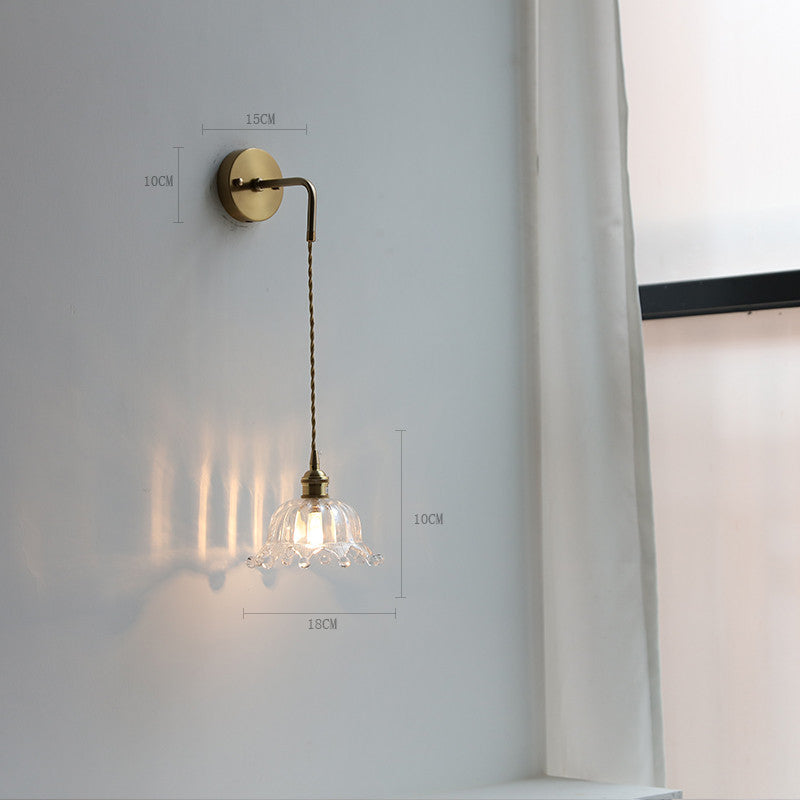 Adjustable Wall Lamp In Front Of Mirror In Bedside