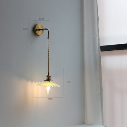 Adjustable Wall Lamp In Front Of Mirror In Bedside