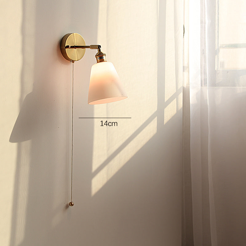 Adjustable Wall Lamp In Front Of Mirror In Bedside