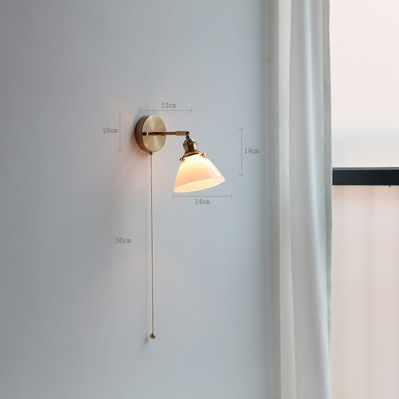 Adjustable Wall Lamp In Front Of Mirror In Bedside