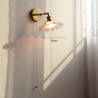 Adjustable Wall Lamp In Front Of Mirror In Bedside