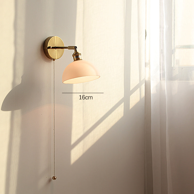 Adjustable Wall Lamp In Front Of Mirror In Bedside