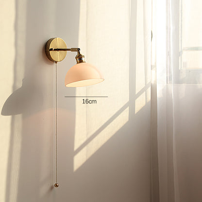 Adjustable Wall Lamp In Front Of Mirror In Bedside