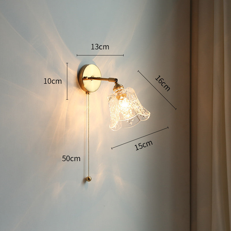 Adjustable Wall Lamp In Front Of Mirror In Bedside