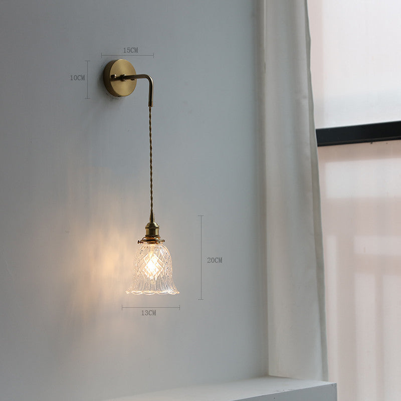 Adjustable Wall Lamp In Front Of Mirror In Bedside